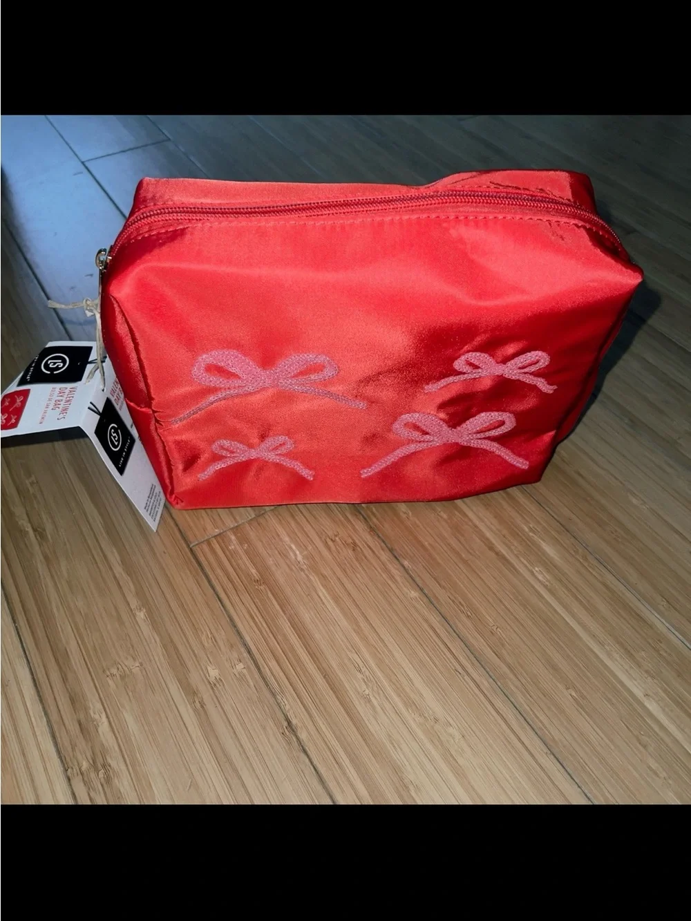New red cosmetic bag with pink sequin bows